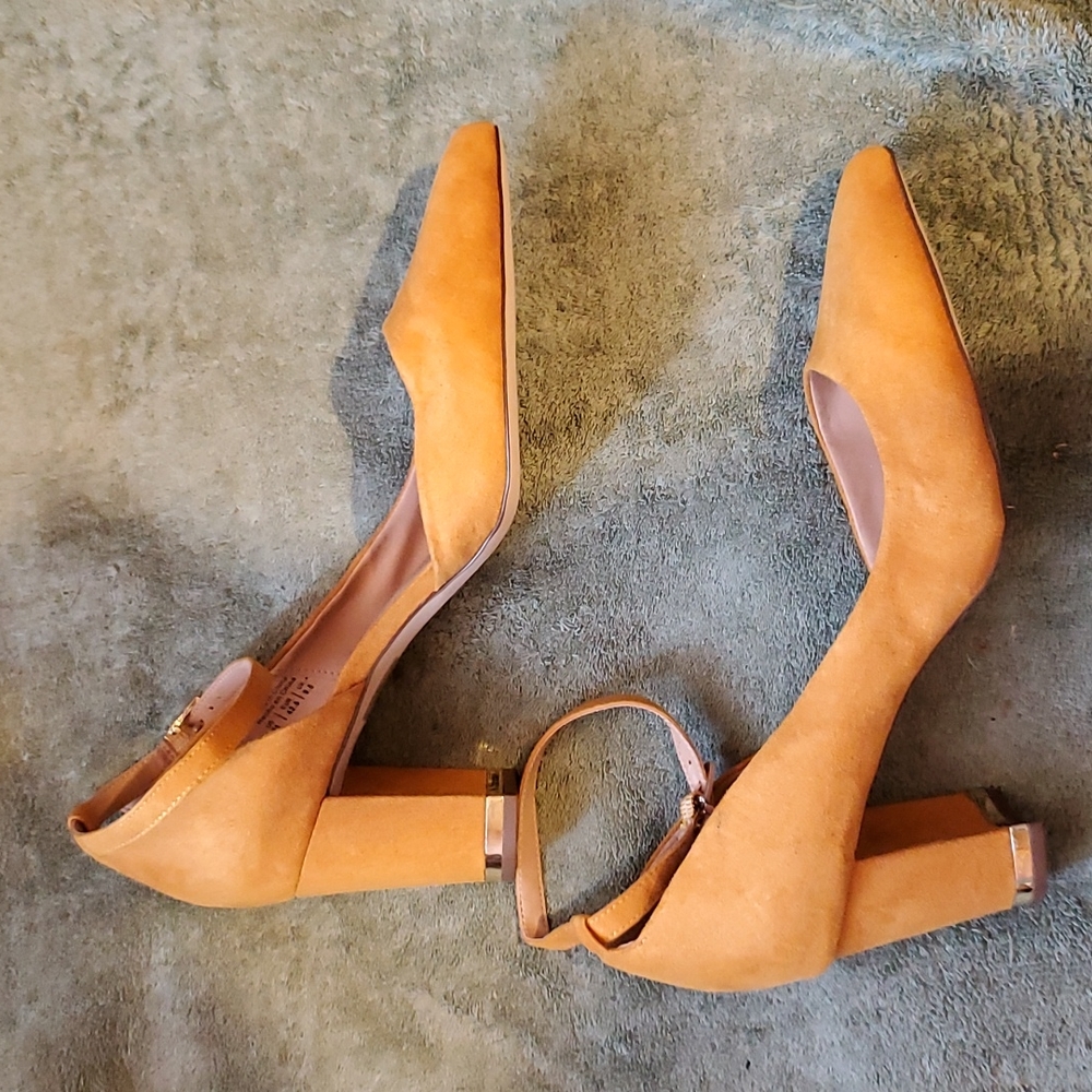 Call It Spring low heeled yellow pumps, never worn. 2 markings shown in photos.